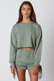 basil green comfy crewneck sweater scrunched shorts set with ties frontal