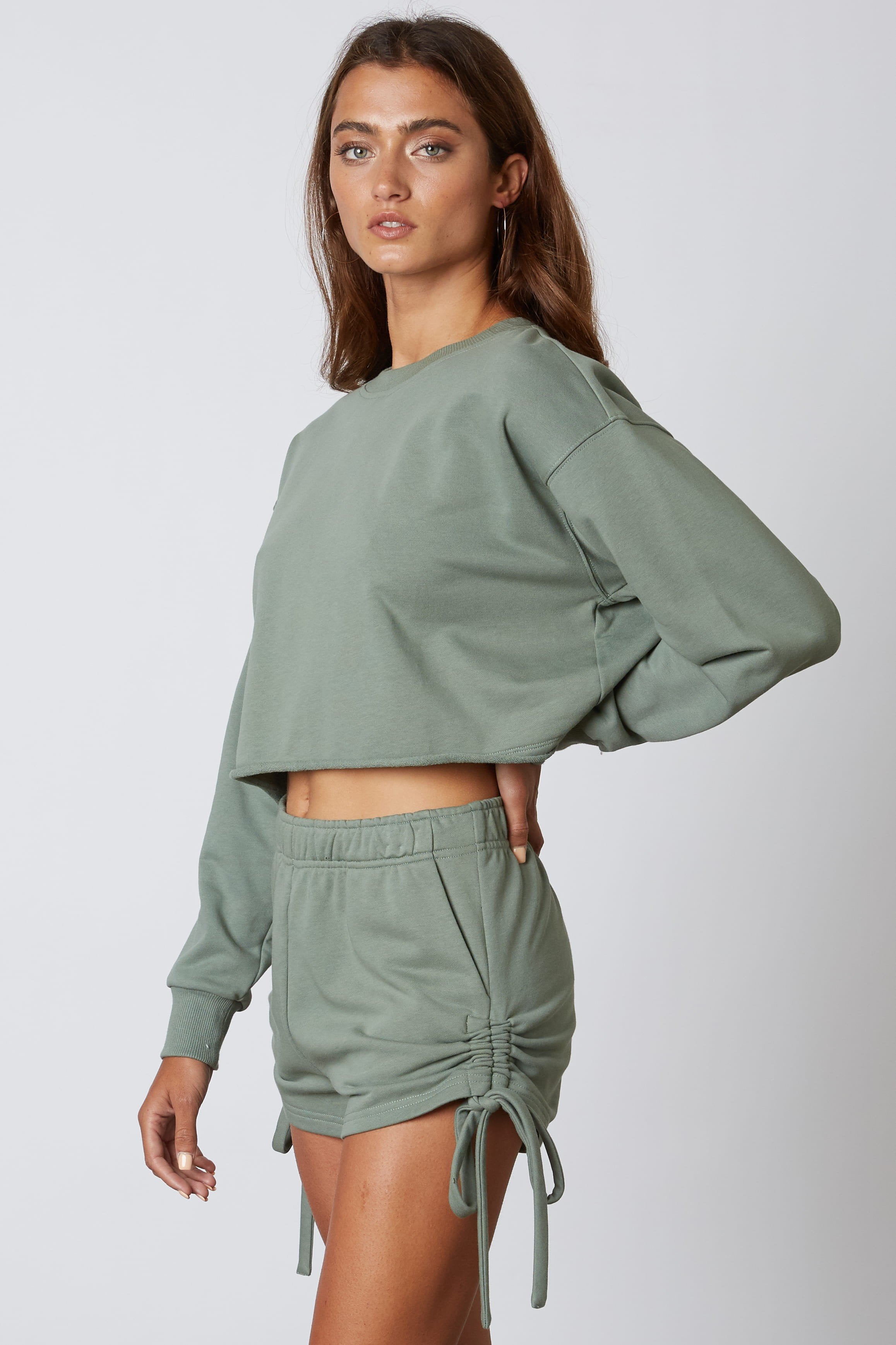 basil green comfy crewneck sweater scrunched shorts set with ties side